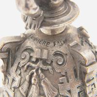 Two French silver figural bells One marked Fannière Frères, Paris, late 19th century
