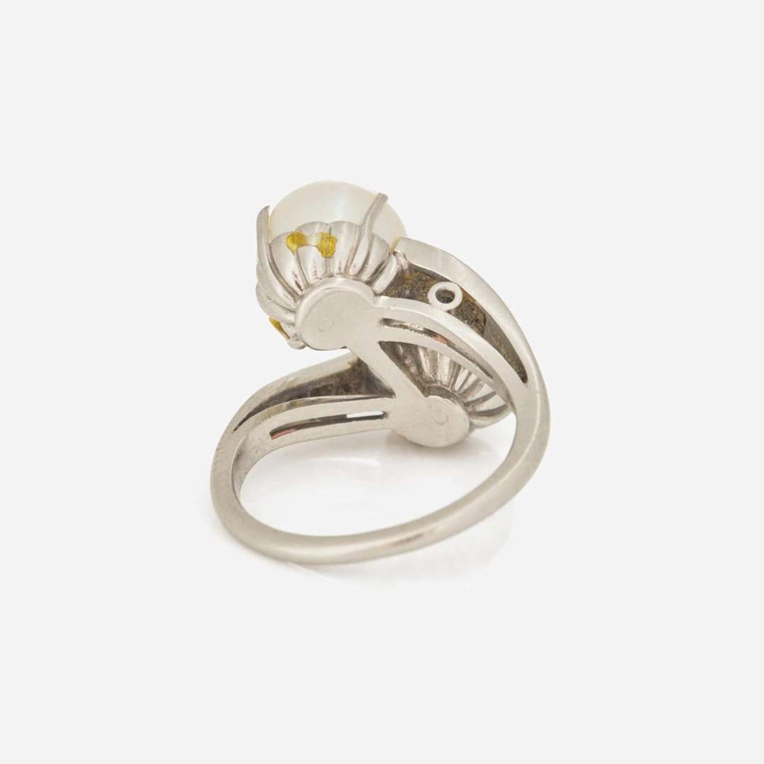 A Platinum, Cultured Pearl, and Diamond Ring