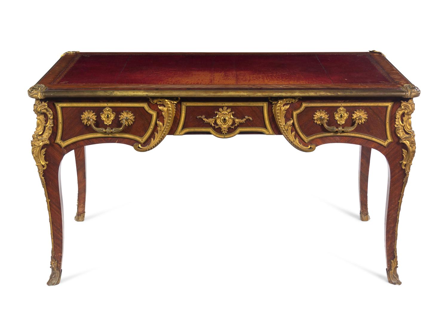 A Louis XV Style Gilt Bronze Mounted Kingwood Bureau Plat