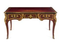 A Louis XV Style Gilt Bronze Mounted Kingwood Bureau Plat