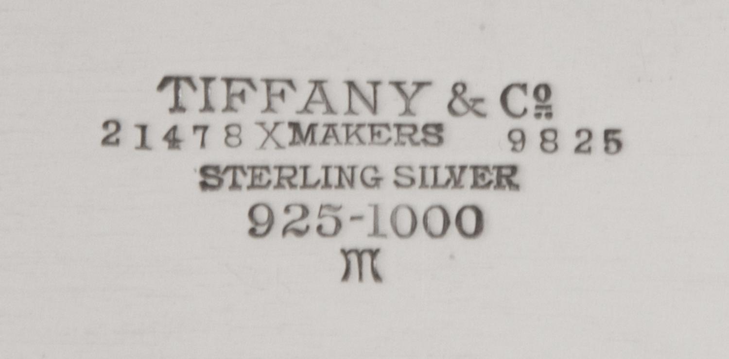 An American Silver Cigarette Box, Tiffany & Co, New York, NY, 1930, rectangular with incised bands, the cover engraved with initial H,