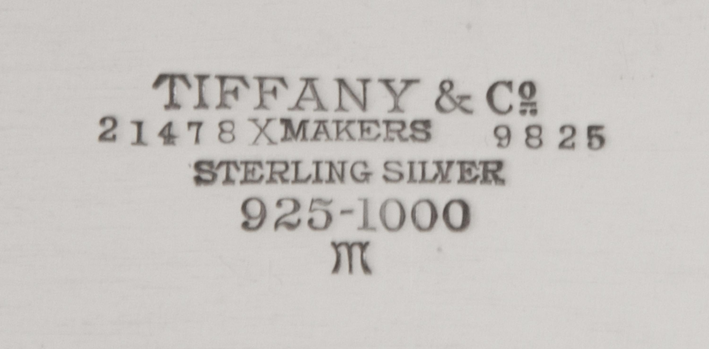 An American Silver Cigarette Box, Tiffany & Co, New York, NY, 1930, rectangular with incised bands, the cover engraved with initial H,