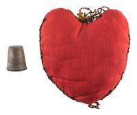 [LINCOLN, Mary Todd (1818-1882)]. A group of 3 items descended directly in the family of Robert Todd Lincoln Beckwith, last male descendent of Abraham Lincoln, including a silver thimble attributed to Mary Todd Lincoln.