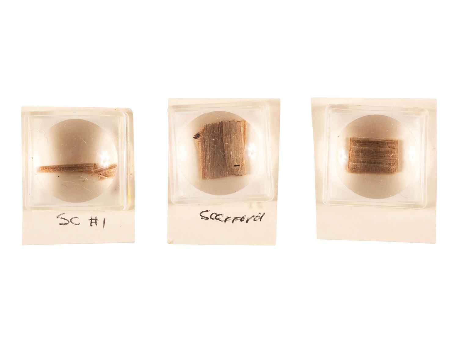 [LINCOLN, Abraham (1809-1865)]. Lincoln relics incl. strands of hair, wallpaper, and wood fragments.