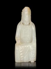 A Carved White Jade Figure of Guanyin
