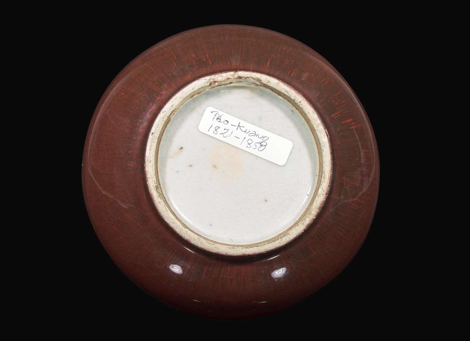 A Chinese "sang de boeuf"-glazed porcelain bottle vase, 18th / early 19th century 牛血紅長頸瓶 十八或十九世紀早期