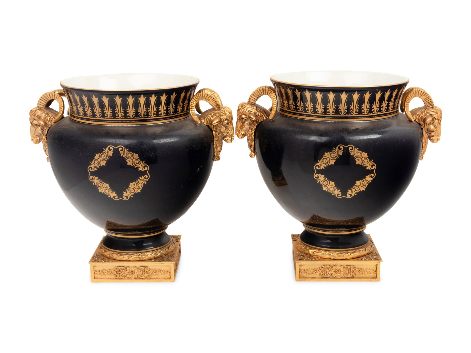 A Pair of Sèvres Style Gilt Bronze Mounted Porcelain Vases