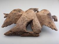 A Carved Walnut Customs House Eagle