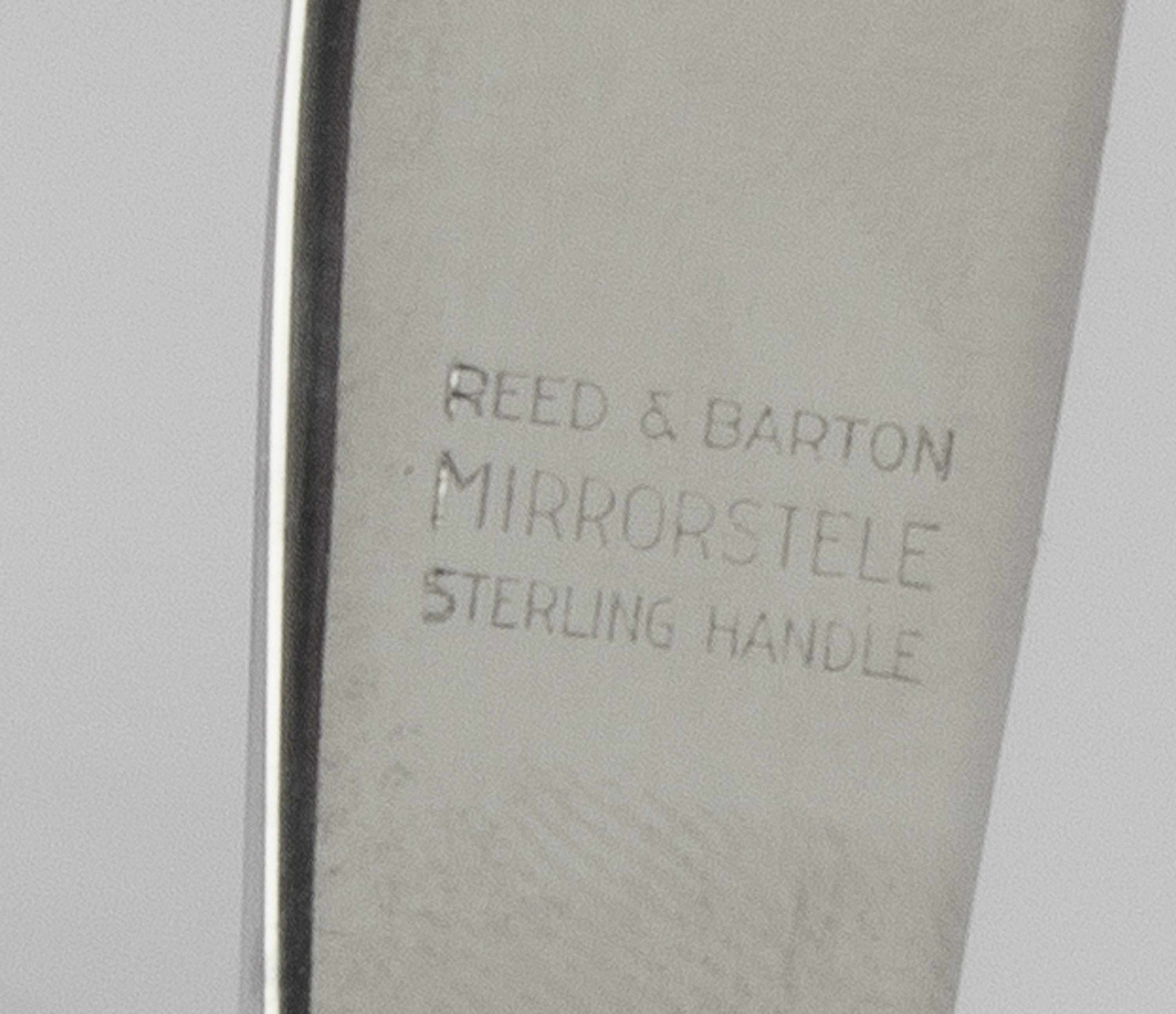 An American Silver Flatware Service, Reed & Barton, Taunton, MA, Silver Sculpture pattern, comprising: 12 dinner knives 12 dinner forks