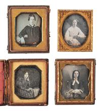 [EARLY PHOTOGRAPHY]. 28 sixth plate daguerreotypes of lovely young women.
