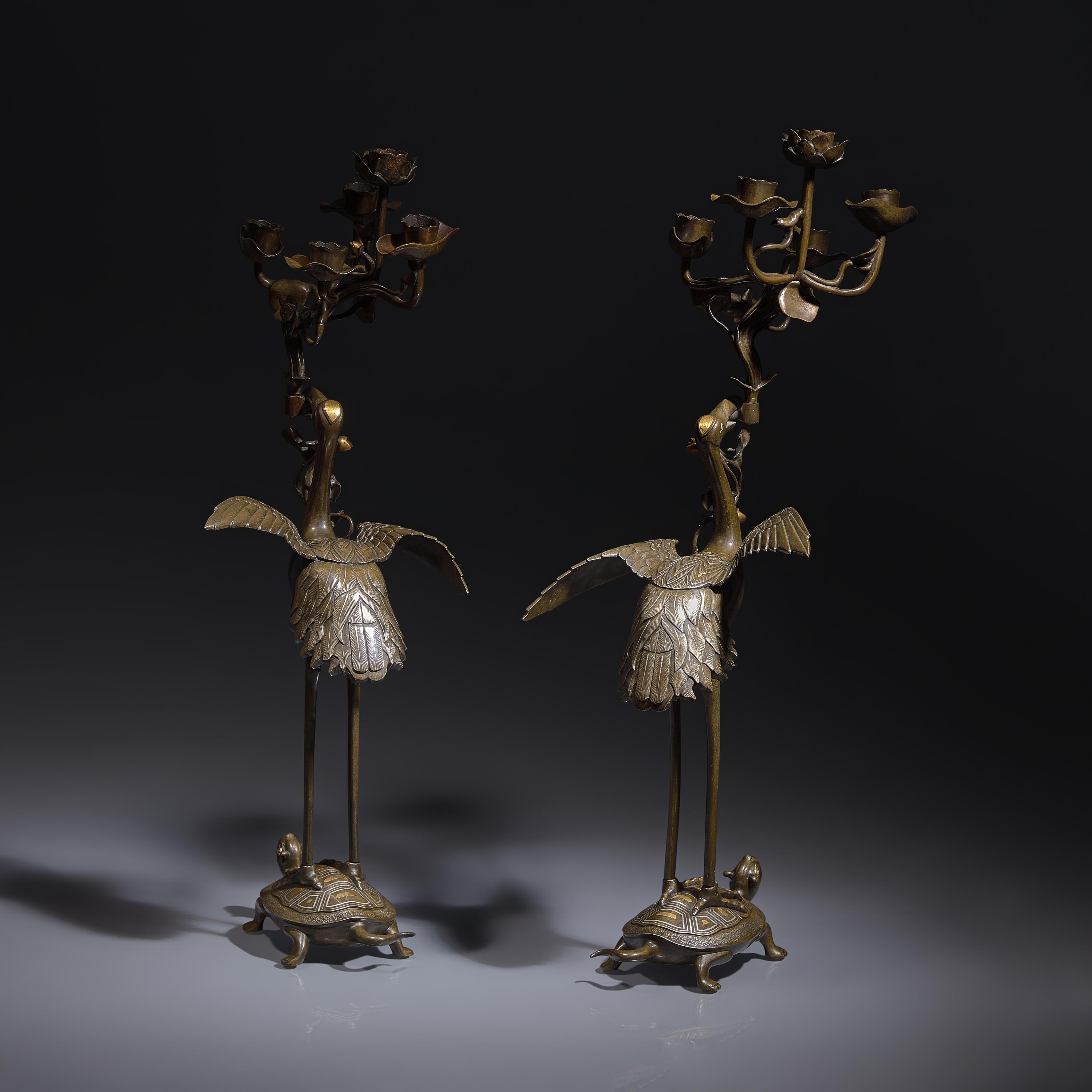 A Pair of Japanese Kaga Style Inlaid Bronze 'Crane and Minogame' Candelabra, Meiji Period — 日本明治時期 銅龜鶴齊齡燭臺一對