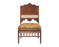An Aesthetic Movement Carved Teak Side Chair