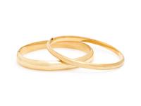 TWO YELLOW GOLD BANGLE BRACELETS