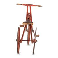 A Carved and Painted Wood Boneshaker Child’s Bicycle