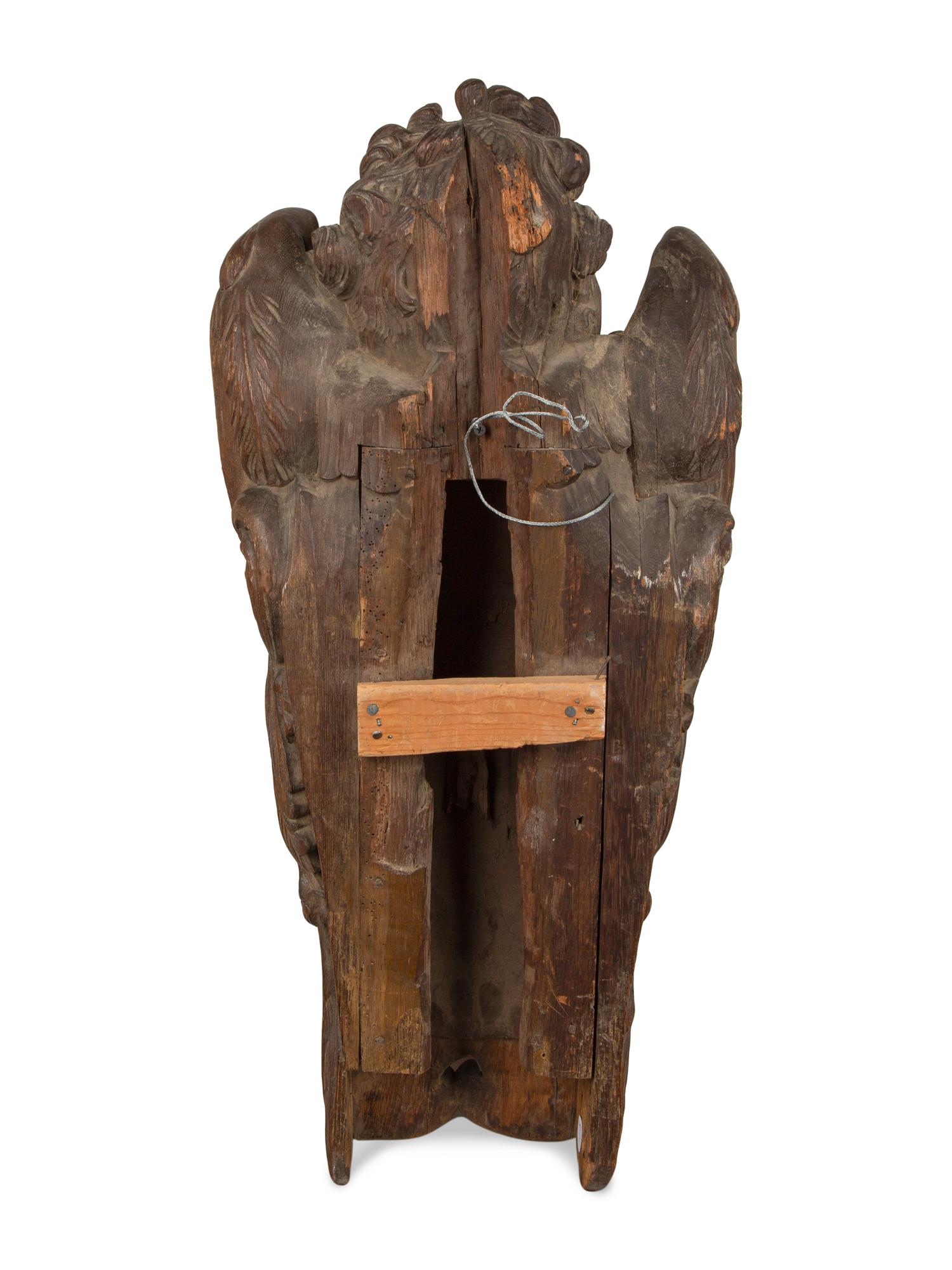 A Pair of Continental Oak Figural Pilasters — 17TH CENTURY