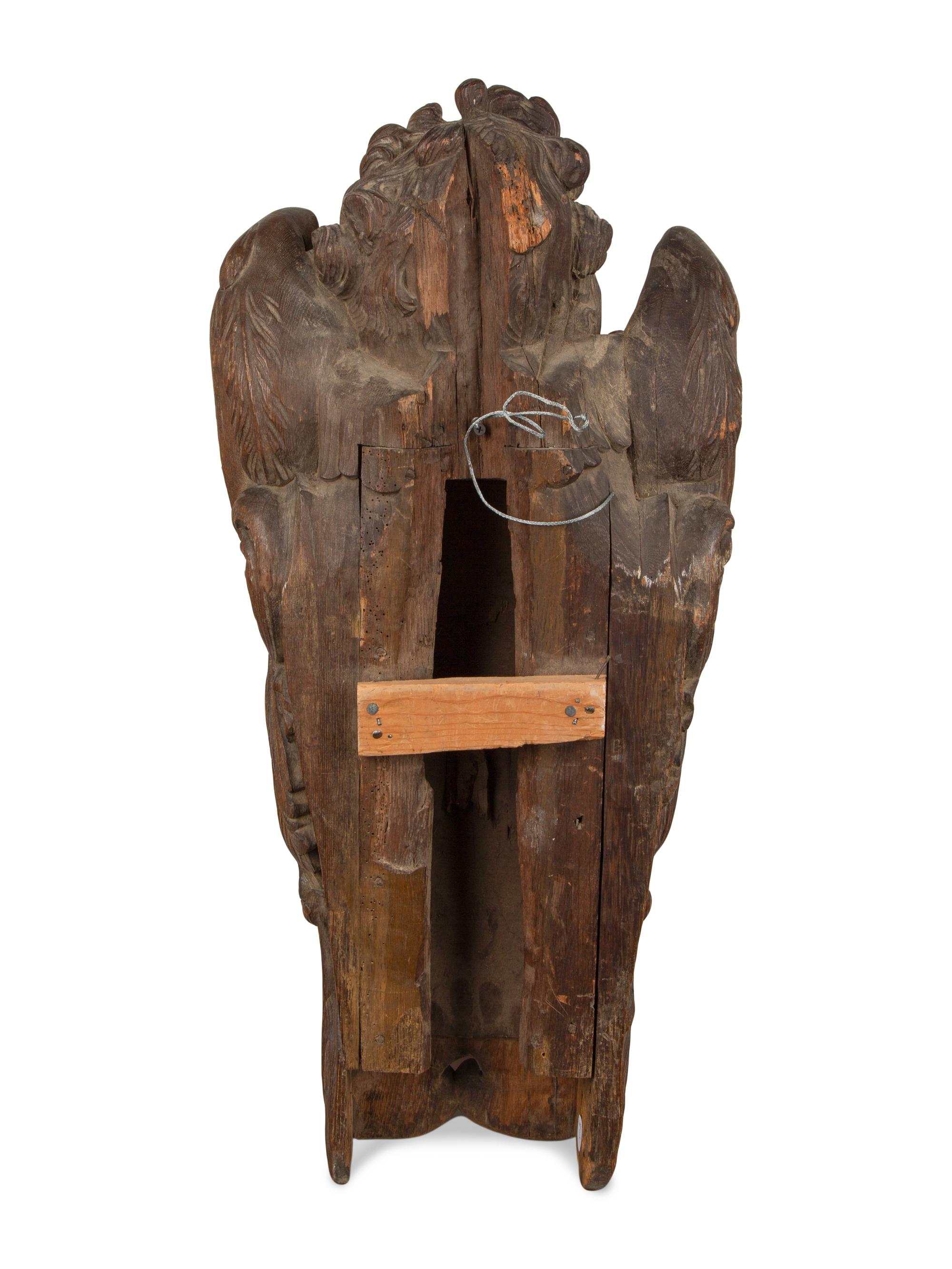 A Pair of Continental Oak Figural Pilasters — 17TH CENTURY