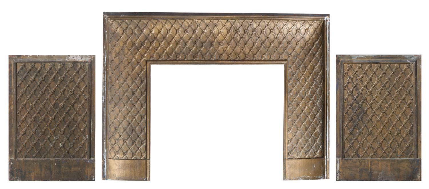 A Gilt Iron Fireplace Surround Height 36 1/2 x width 50 inches; height of aperture 26 x width 30 inches.