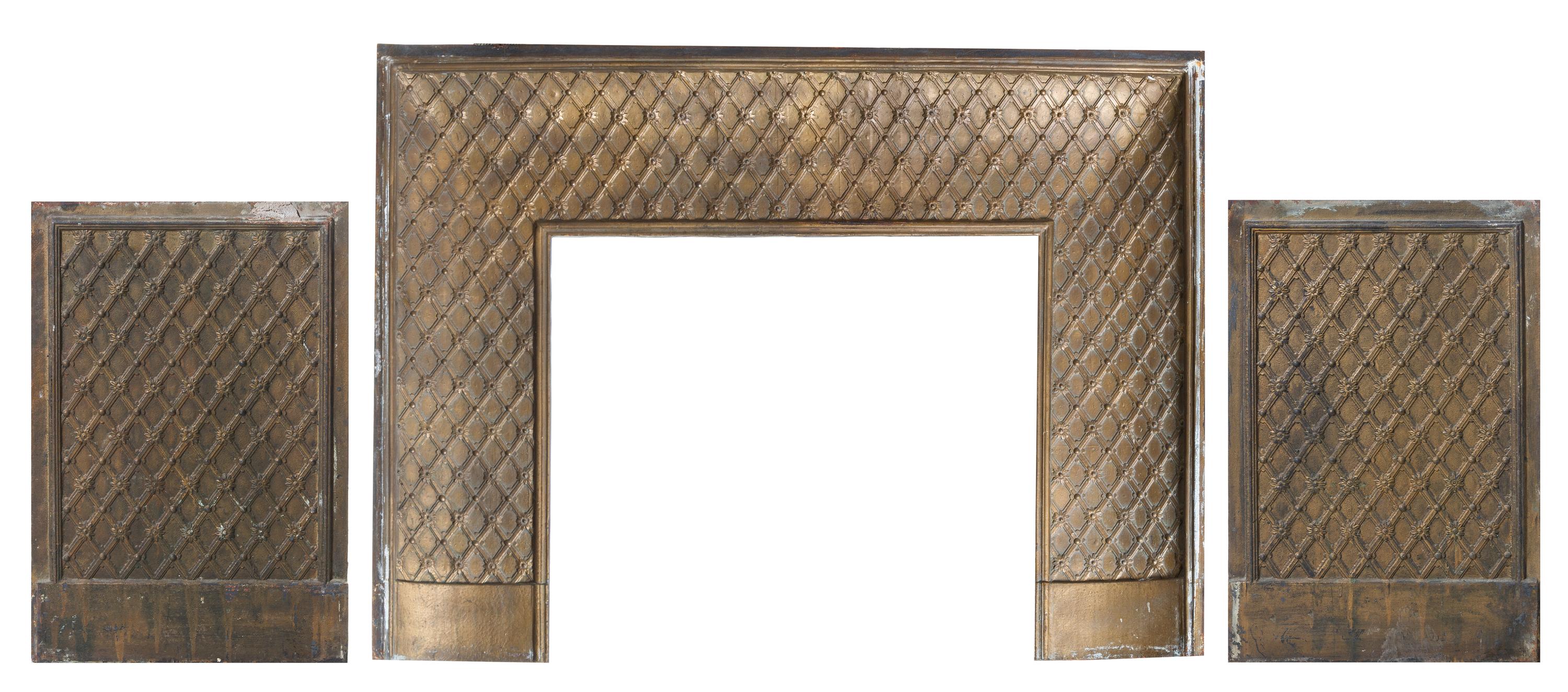 A Gilt Iron Fireplace Surround Height 36 1/2 x width 50 inches; height of aperture 26 x width 30 inches.