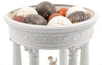 A Grand Tour Style Bisque Architectural Model with a Collection of Bone and Marble Ornaments