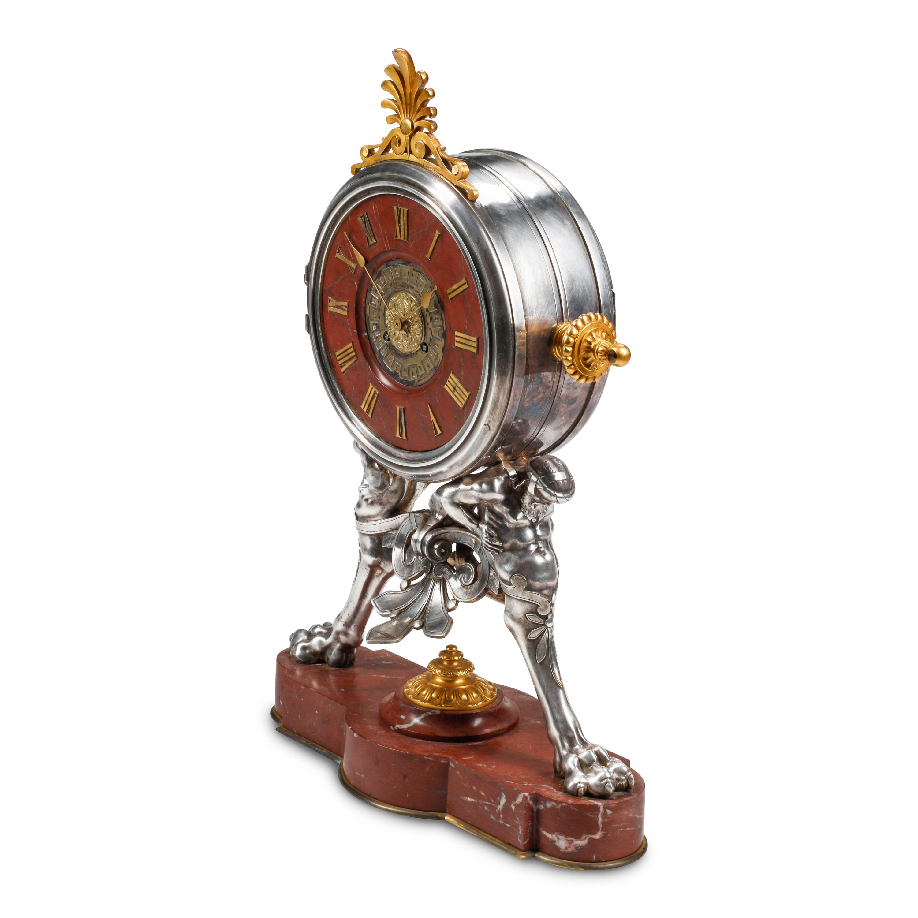 A French Neoclassical Silvered and Gilt Bronze and Red Marble Clock