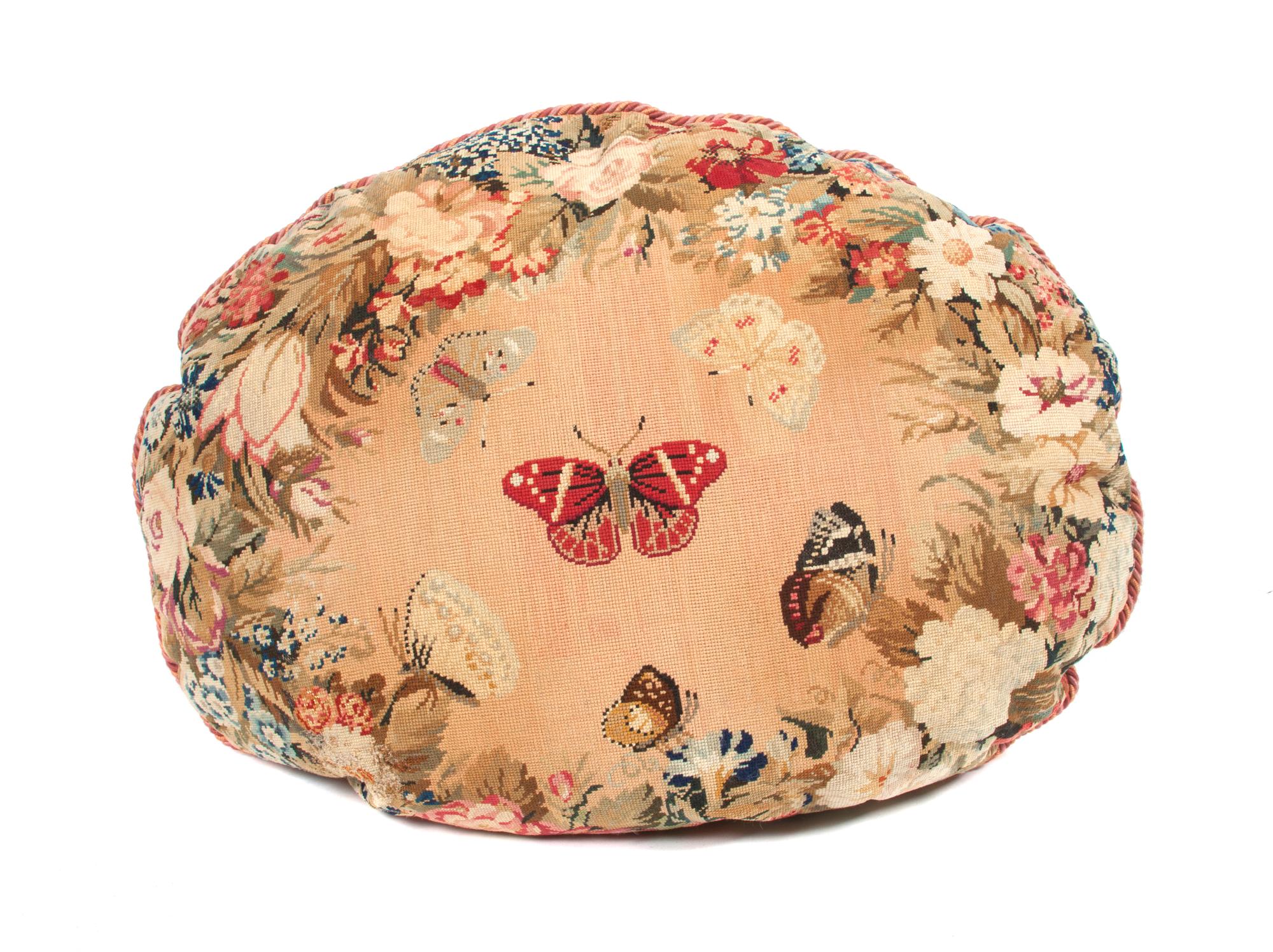 A Needlepoint Upholstered Pillow Width 26 inches.