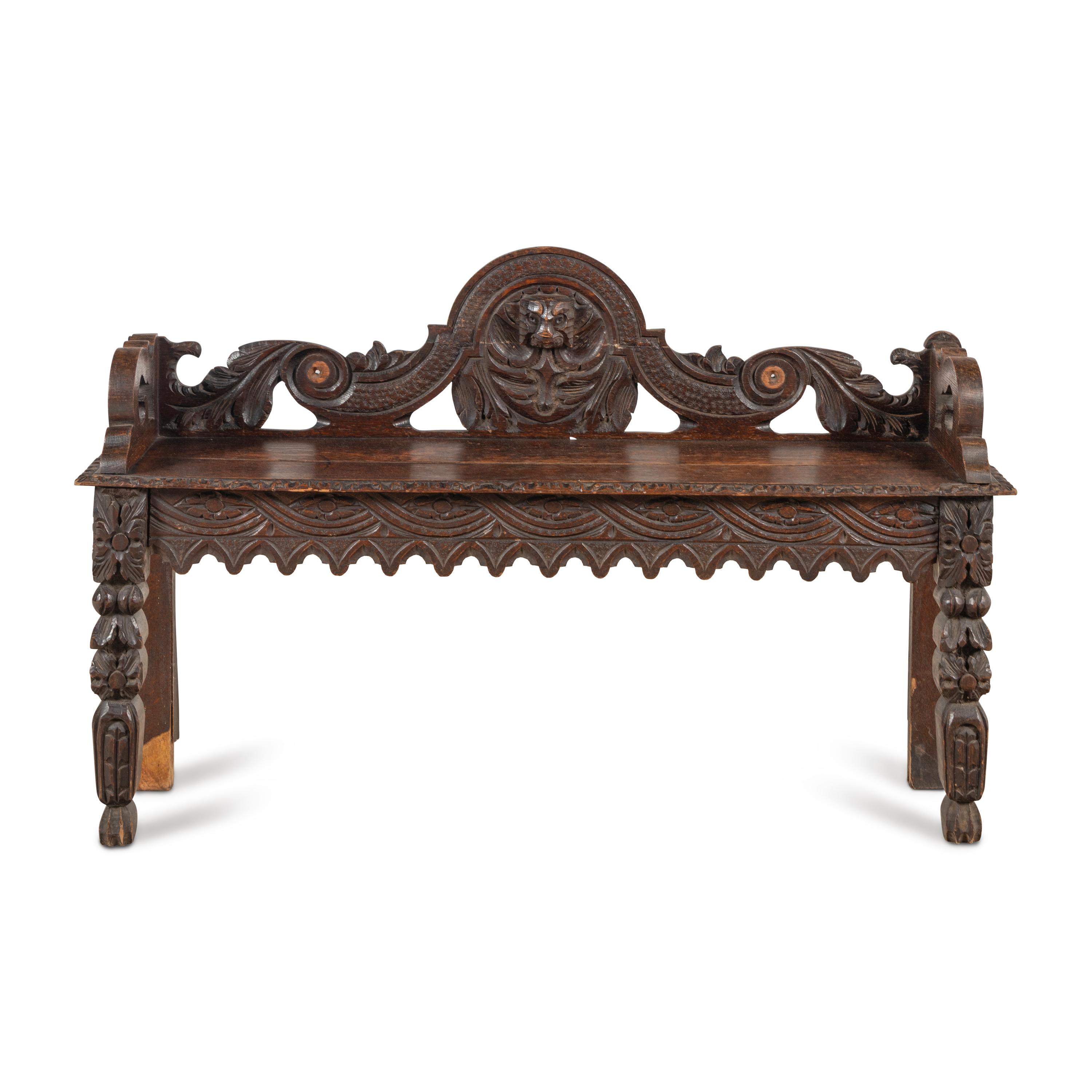 An Italian Carved Oak Hall Bench