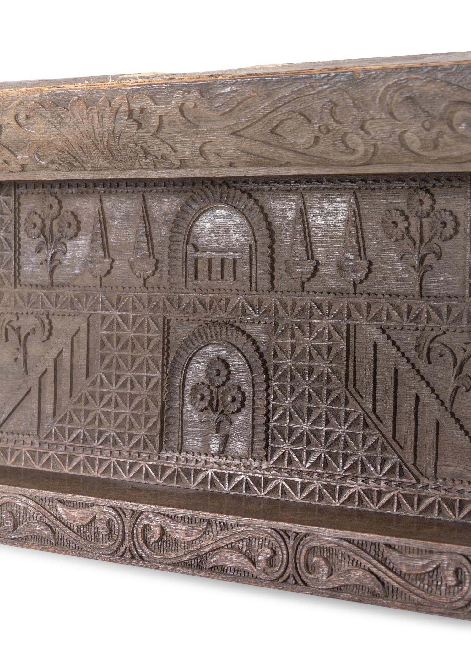 An English Carved Oak Hanging Rack in the William and Mary Taste