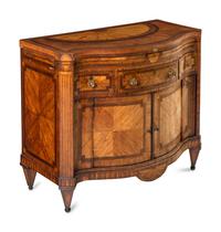 An Anglo-Dutch Tulipwood, Rosewood, Mahogany and Burr Elm Serpentine Klapbuffet