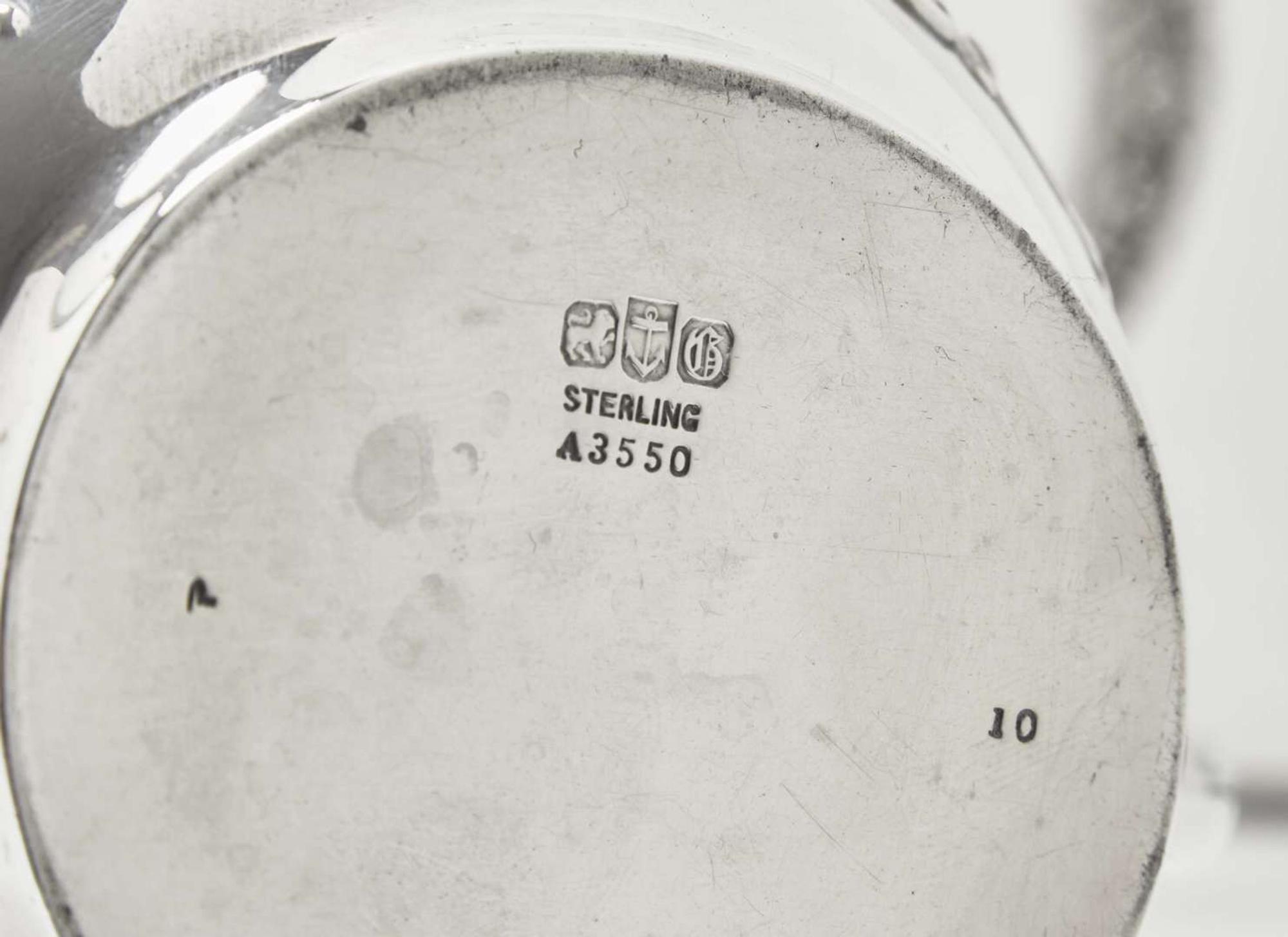 A five-piece sterling silver floral repoussé tea and coffee service, Gorham Mfg. Co., Providence, RI, bearing date mark for 1883