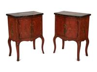 A Pair of Venetian Style Red Painted Cabinets