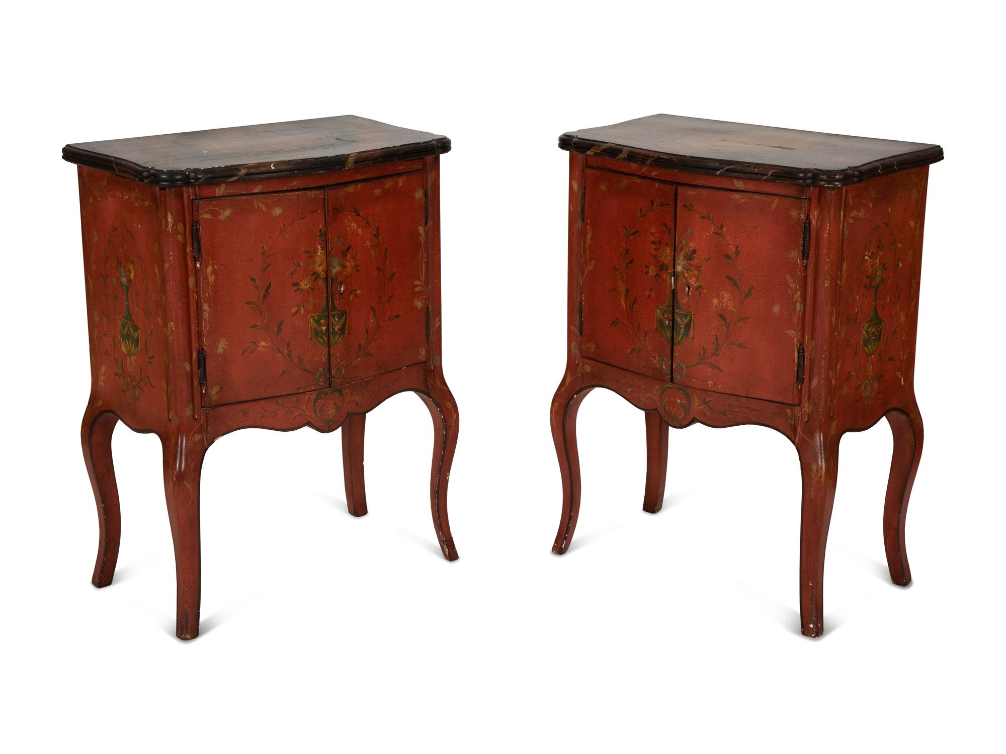 A Pair of Venetian Style Red Painted Cabinets