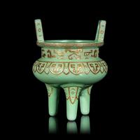 A Chinese Gilt Highlighted Green Glazed Porcelain Ding -Form Censer, Qing Dynasty 清 綠地金彩凸雕仿古鼎式爐