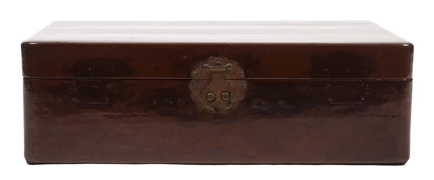 A Wooden Trunk with Engraved Clasp