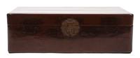 A Wooden Trunk with Engraved Clasp