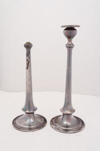 A Pair of Arts & Crafts Spot-Hammered Silver Candlesticks