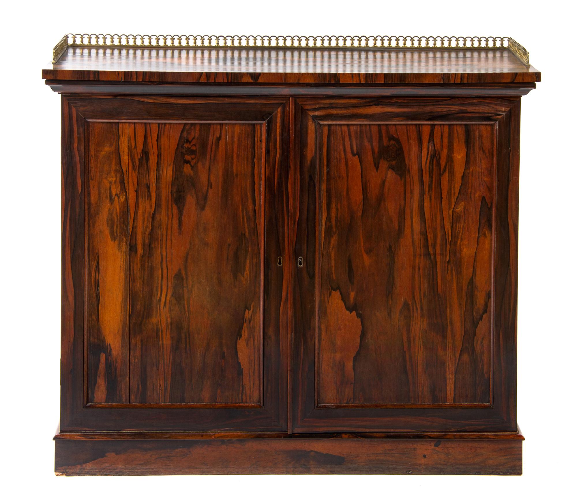 A Regency Gilt Bronze Mounted Calamander Cabinet Height 37 1/2 x width 45 x depth 16 1/2 inches. — CIRCA 1820