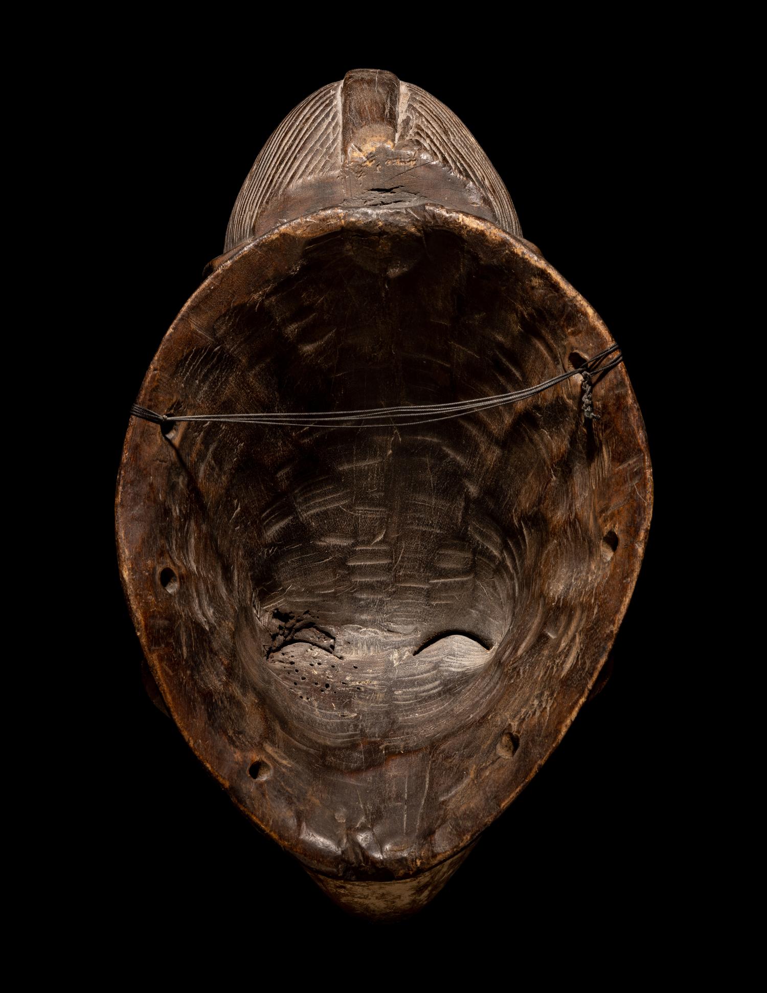 Four Punu Wood Masks