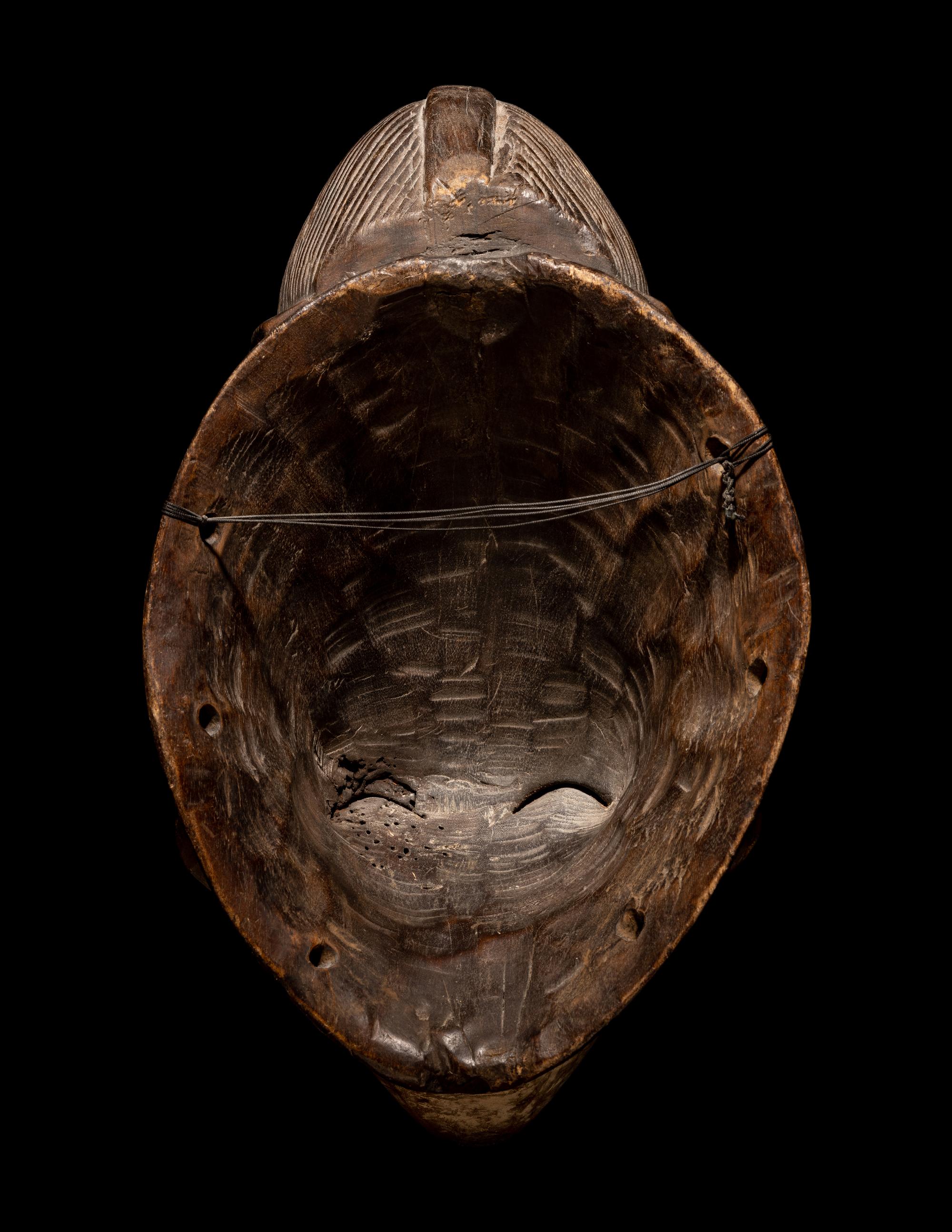 Four Punu Wood Masks