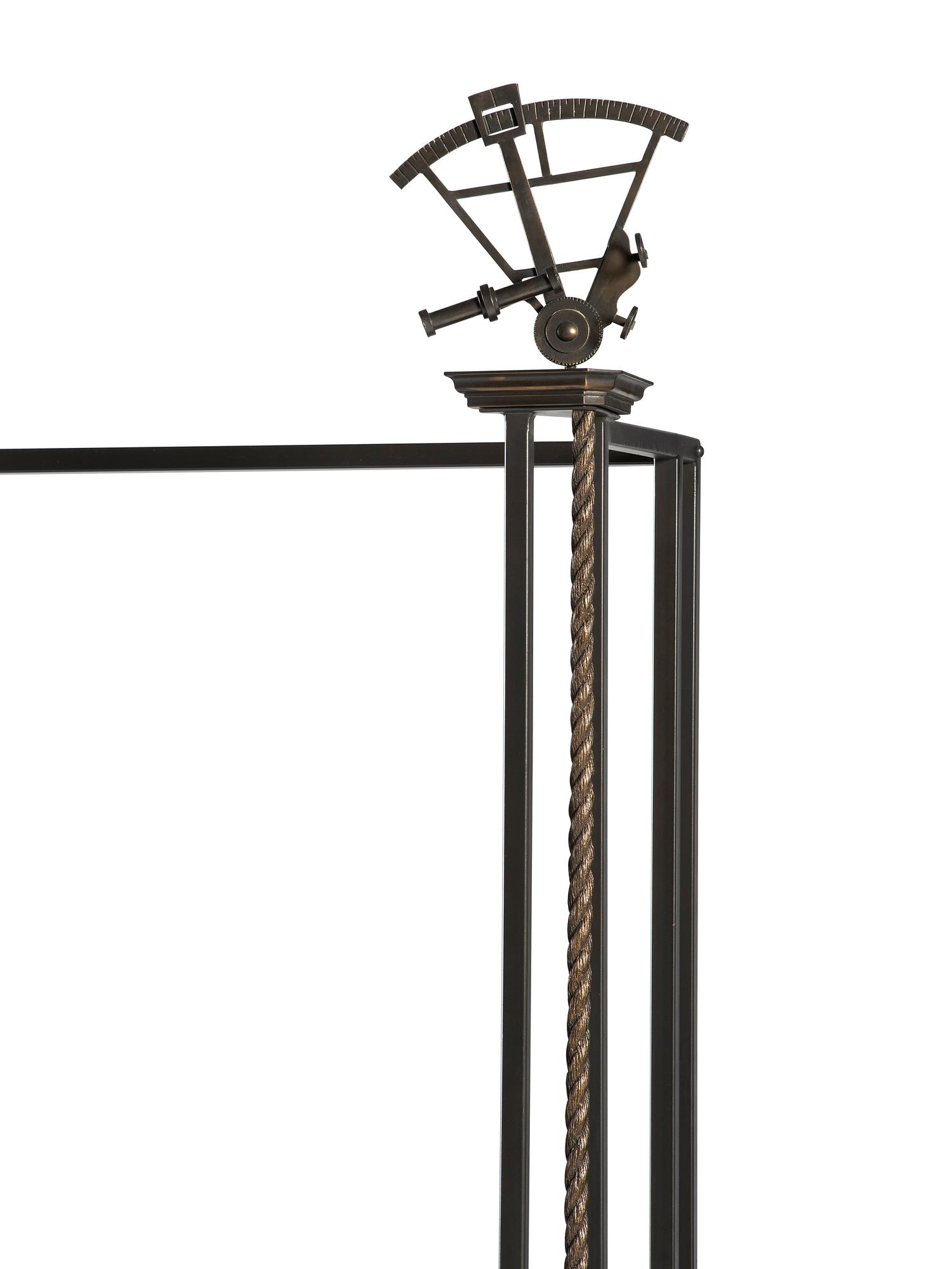 A Cast Iron and Bronze Nautical Themed Three-Tiered Bookshelf