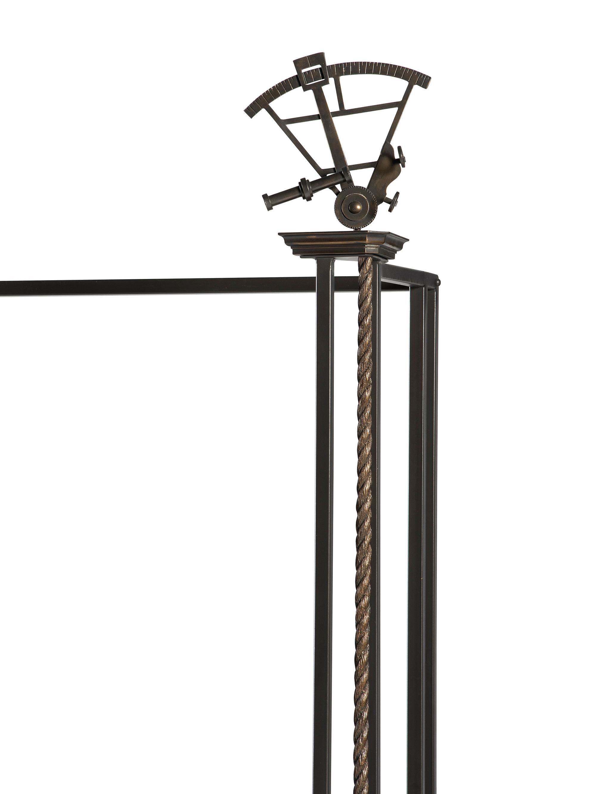 A Cast Iron and Bronze Nautical Themed Three-Tiered Bookshelf
