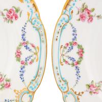 A Set of Eighteen Mintons Porcelain Plates