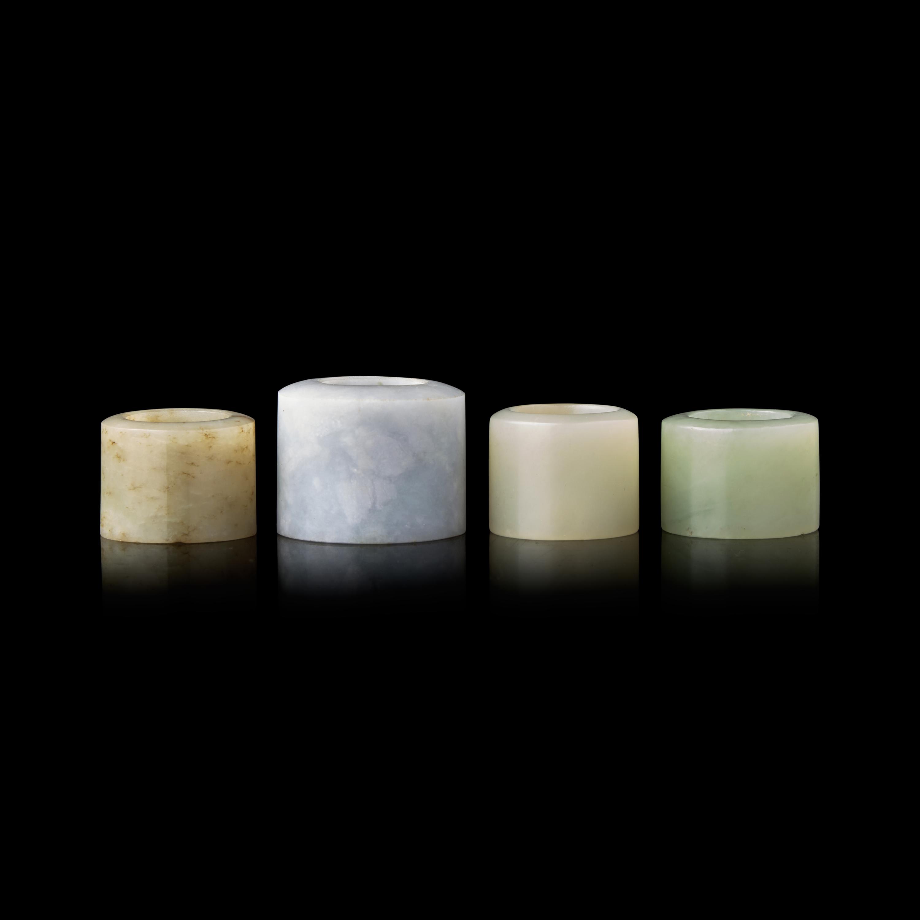 Four Chinese Jade and Jadeite Archer's Rings 翡翠、玉扳指一組四枚