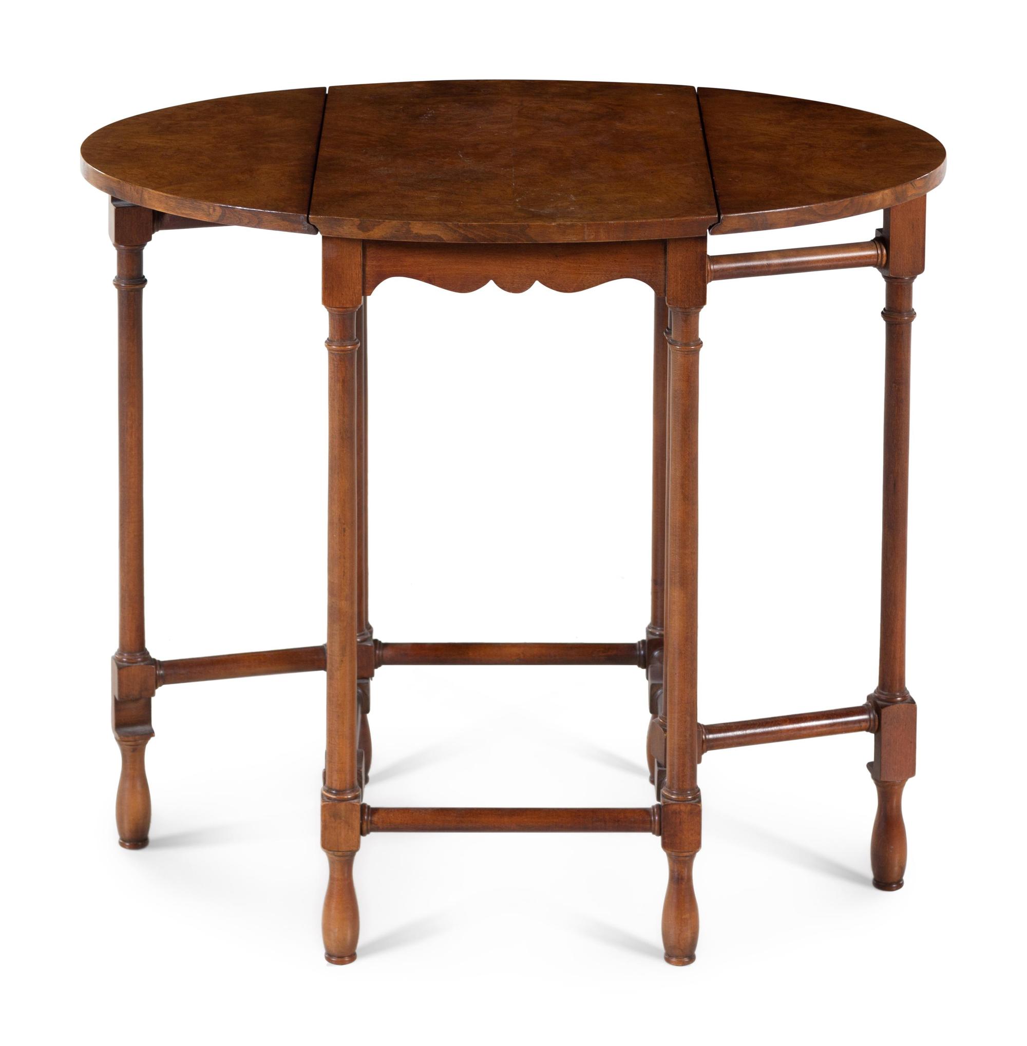 A George III Style Gate-Leg Table — BAKER
