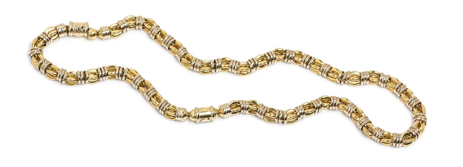 A Convertible 18 Karat Bicolor Gold Fancy Link Demi-Parure, Sauro, 91.15 dwts.