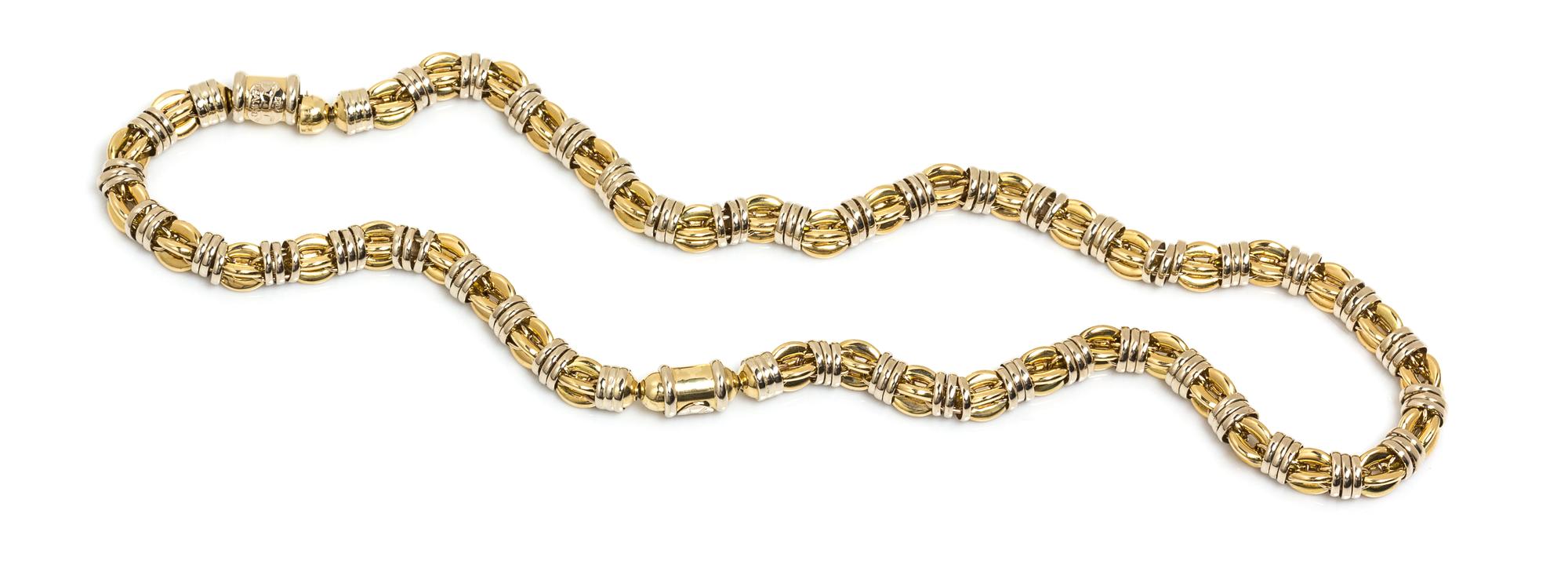 A Convertible 18 Karat Bicolor Gold Fancy Link Demi-Parure, Sauro, 91.15 dwts.