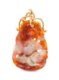 A 14 Karat Yellow Gold and Jadeite Pendant,