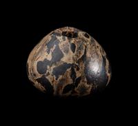 An Egyptian Breccia Mace Head