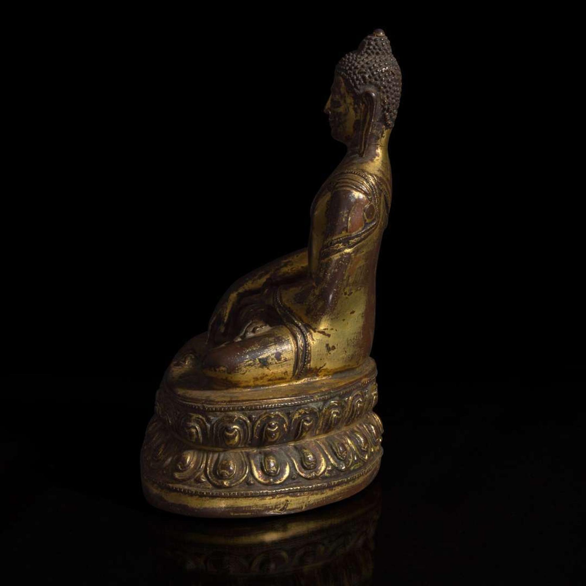 A Himalayan gilt copper alloy figure of Buddha Akshobhya 喜马拉雅铜鎏金阿閦佛造像 14th Century or earlier ???????