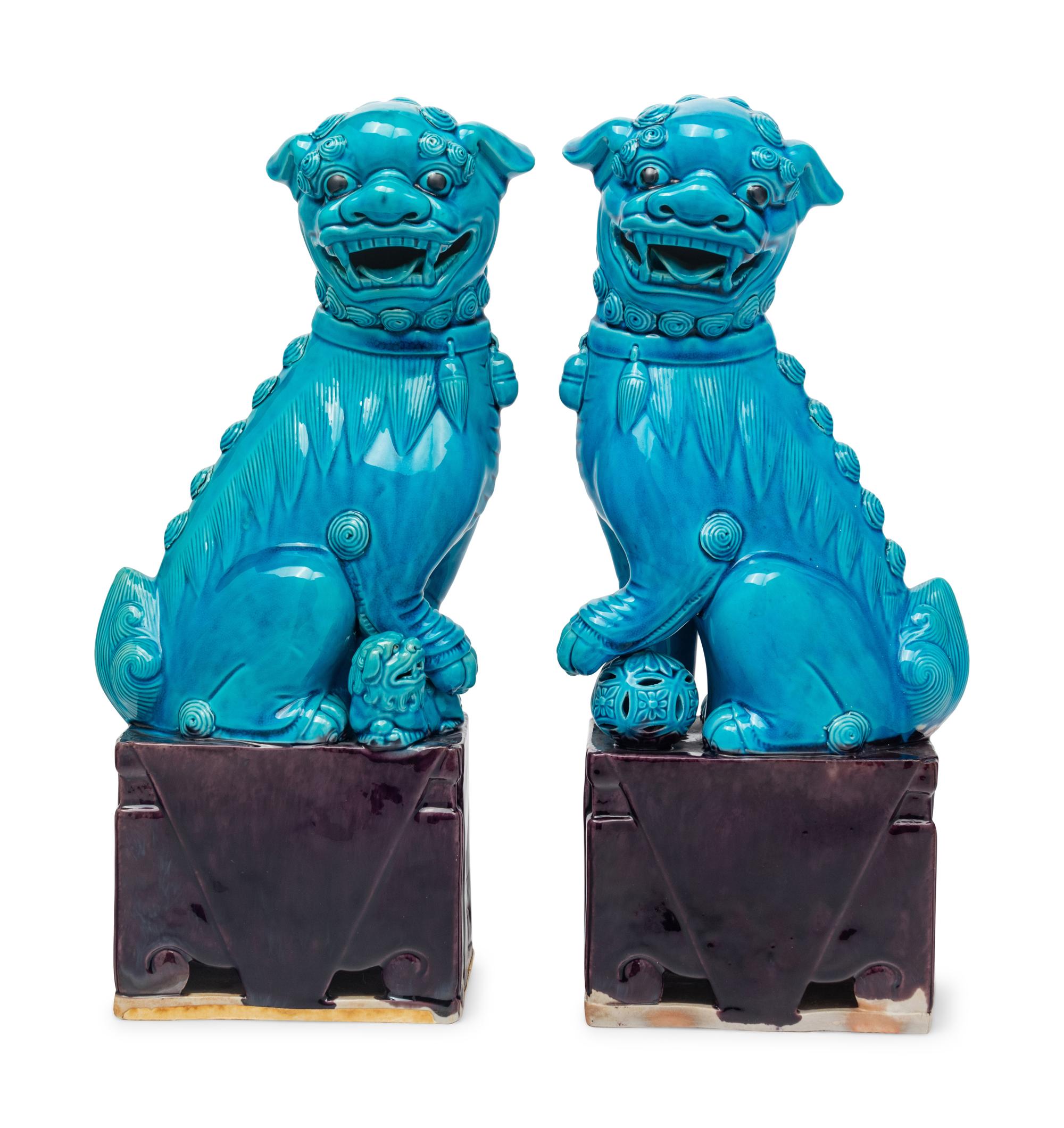 A Pair of Chinese Export Turquoise Glazed Guardian Lions