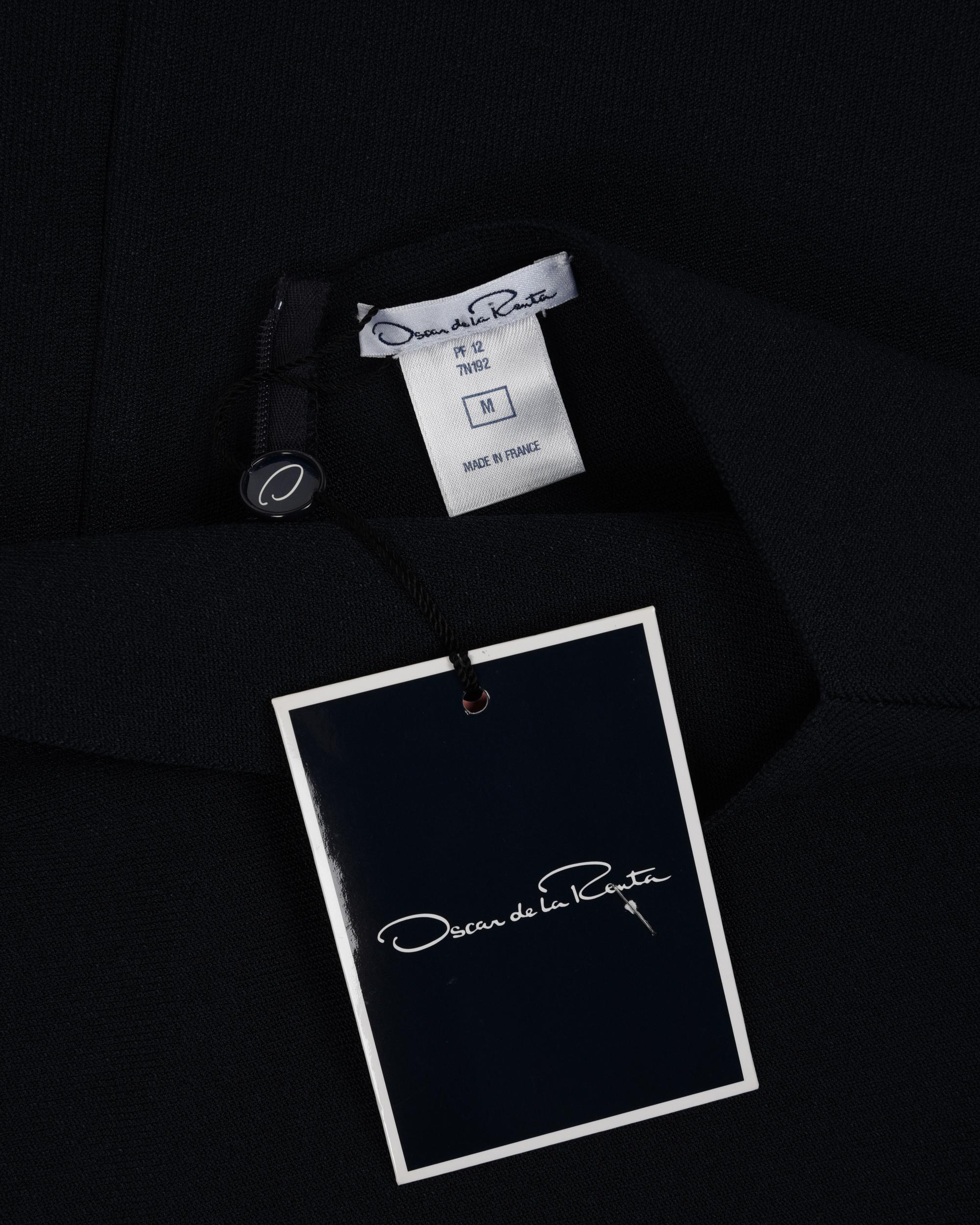 Four Designer Dresses: Two Oscar de la Renta, One Balenciaga, and One Christian Dior, 2000s